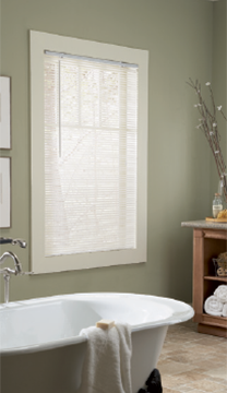 Room scene with white wand tilt mini blinds in a bathroom